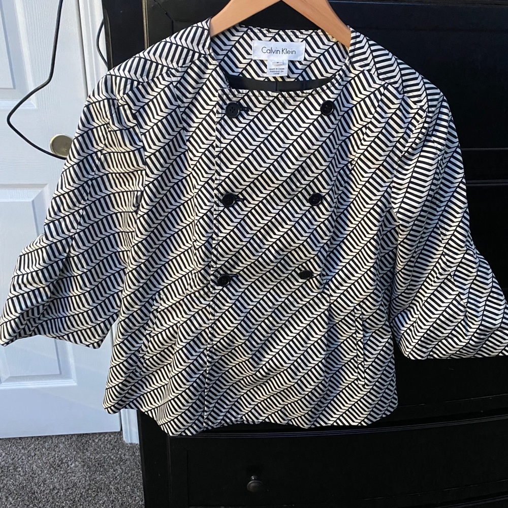 Almost brand new Calvin Klein sweater for girls.